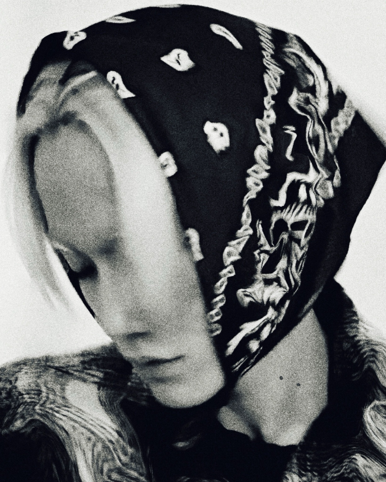 Monochrome side profile in a headscarf