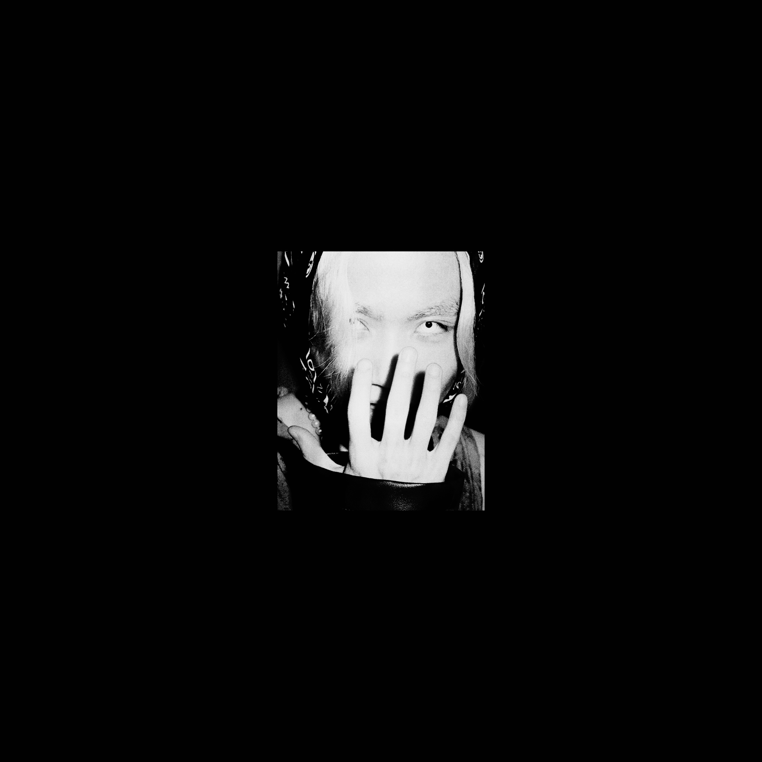 Monochrome portrait surrounded by black space