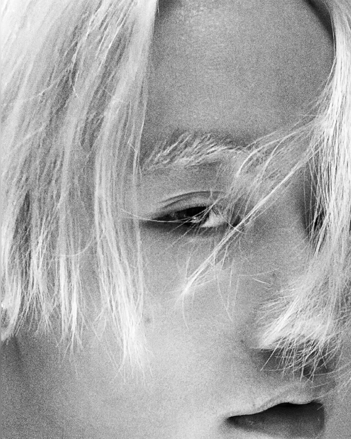 Face close-up with a negative-film texture